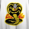 Cobra Kai Yellow And Black Cobra Women's White 21" Cropped T-shirt -Cheap Clad Fine Store GUEST 18ee8e7b adad 4545 b59a 8346df65e49c